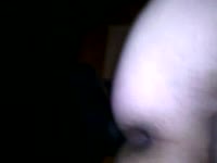 Close up on man's balls while his dog knots him